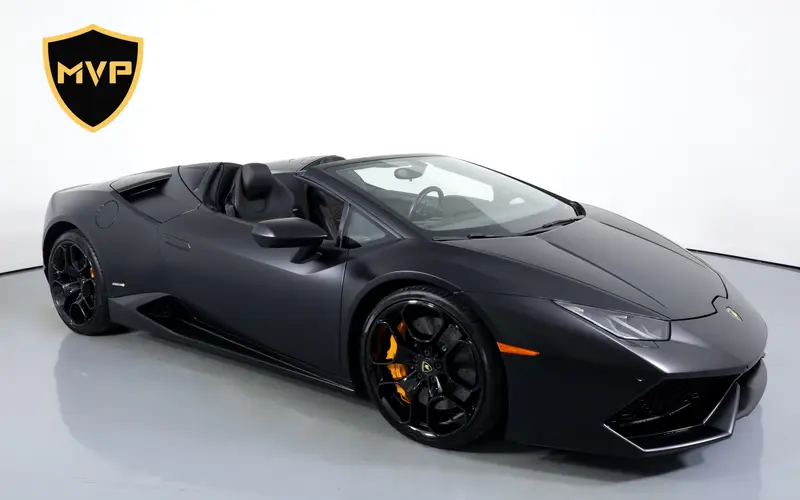 2022 Lamborghini Huracán EVO Spyder, black exterior, for rent in Miami